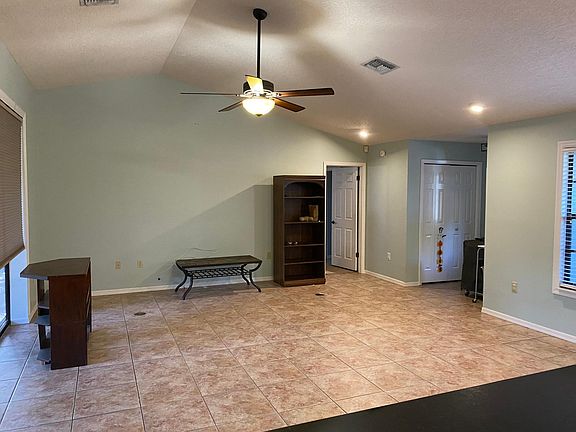 Kitchen looking into living room