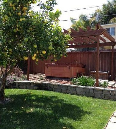 Back yard and pergola (hot tub not included)