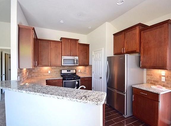 Photo of similar home. Actual home under construction.