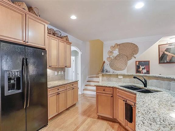 Large Kitchen with granite countertops and GE appliances