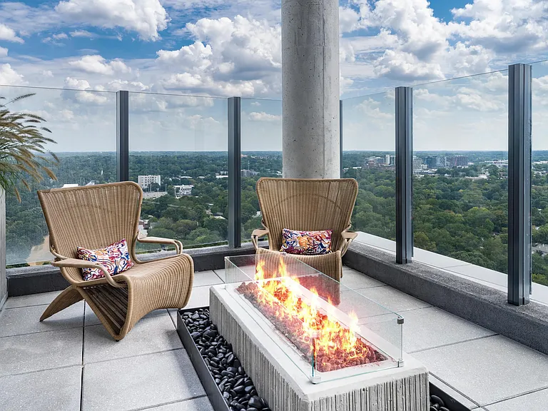 A rooftop fire pit offers a quiet place to unwind with sweeping Atlanta views, elevated above the city and close to parks, dining, and culture.