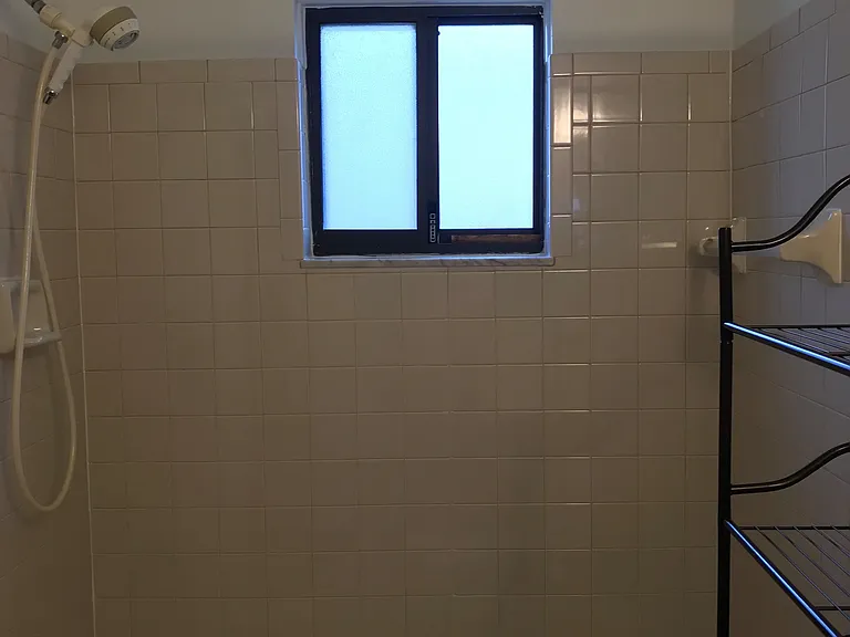 Bathroom freshly painted, tub freshly caulked.
