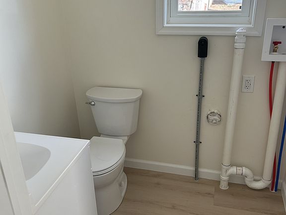 1st floor half bath and stackable laundry hookup. 5x5.