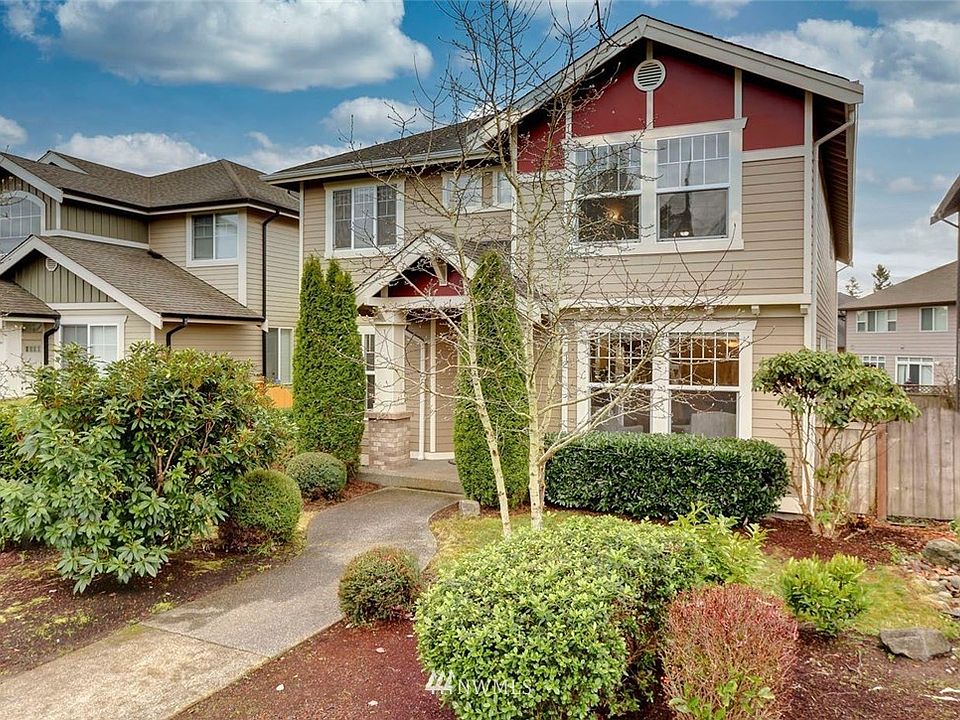 ~Welcome Home~  This amazing Tamarack Ridge stunner is just what you have been waiting for!  Enter to soaring ceilings, hardwood floors and large, light filled rooms.  The main floor boasts two separate living spaces, one with gas burning fireplace as well as formal dining room and immense kitchen with island and room for second informal eating area.  Downstairs also boasts office or 4th bedroom.  Upstairs includes oversized open bonus room plus 3 more bedrooms, the primary suite includes 5-piece en suite bathroom.  This home also includes A/C for those warm summer nights.  Quiet neighborhood is just minutes from schools, Costco and sought-after Covington amenities.  Ideal commuter location w/easy access to freeways and SeaTac airport.