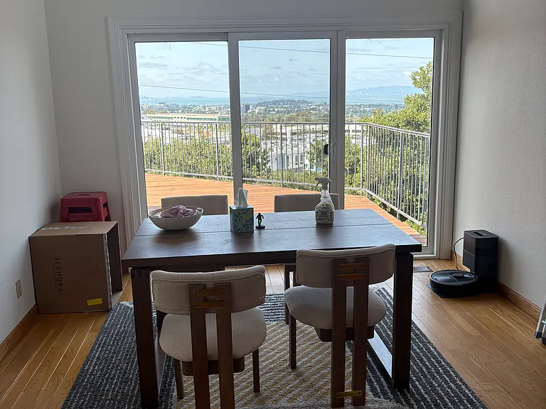 dining room area with sliding door access to deck