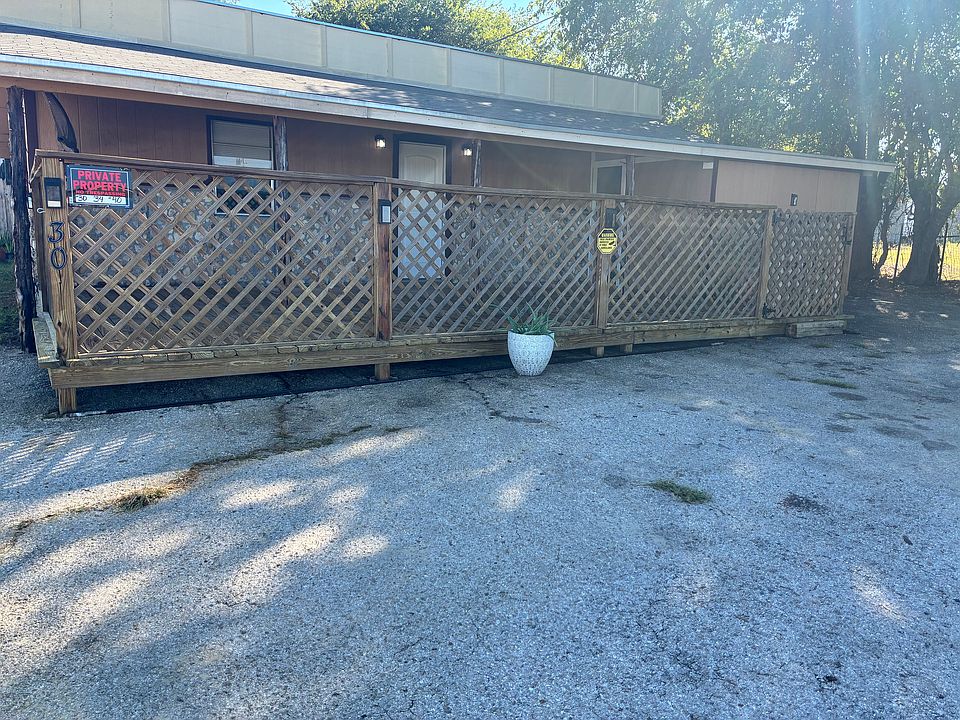 1/2 covered deck
Asphalt parking