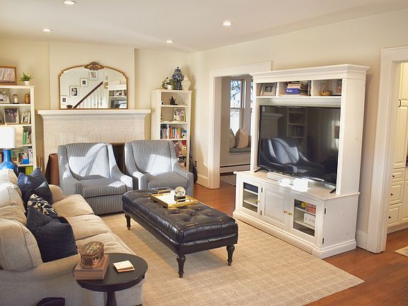 The family room with hardwood floors throughout has lots of character.