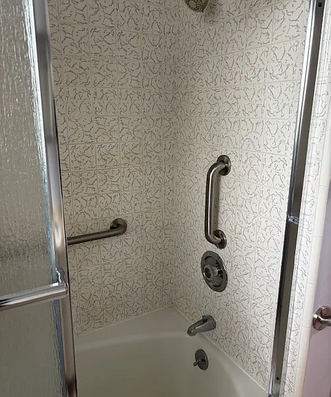 Shared bathroom shower/tub.