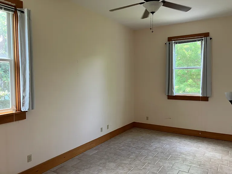 Two windows in left bedroom