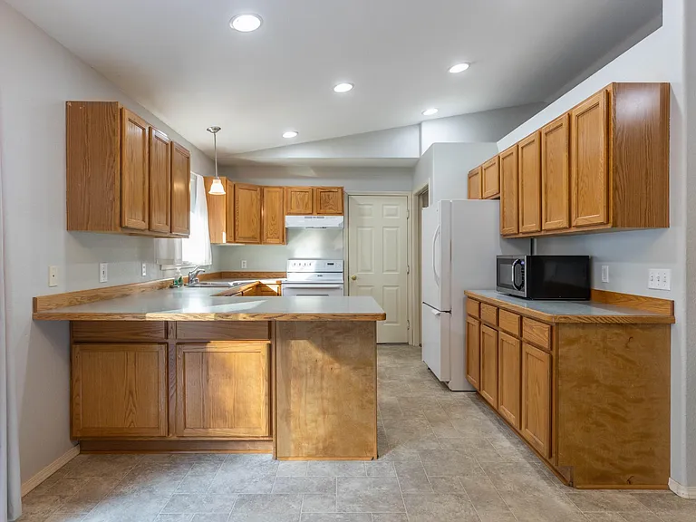 looking into the kitchen (looking from the dining room)