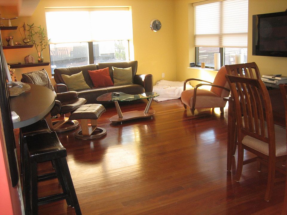 third level living room and kitchen