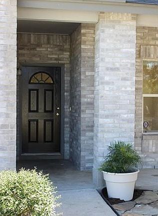 Close up of entryway and newly painted front door