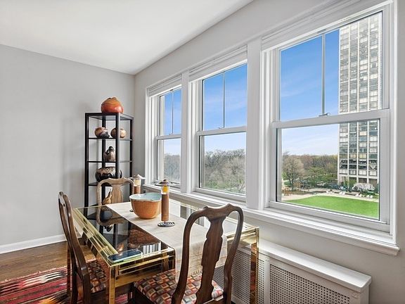 The far side of the living room with windows overl