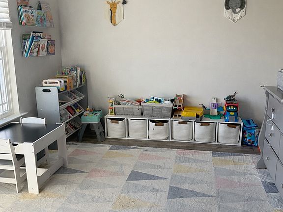 Flex room right off of entryway ,no carpet. Can be used as an office space or kids play room