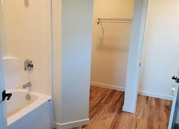 Master bedroom bathroom with walk-in closet