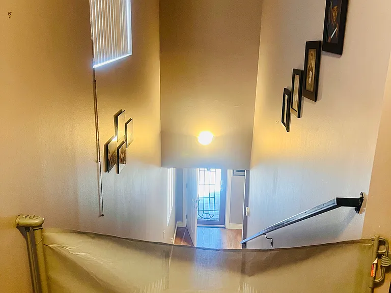 Stairs have a closable screen at the top & bottom