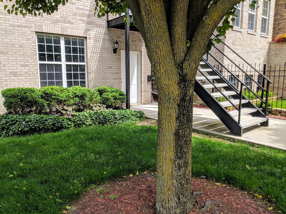 Unit 1 and front yard