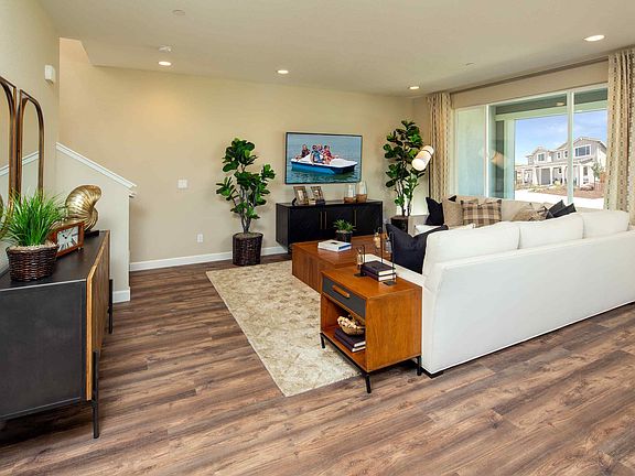 This stylish plan showcases a gourmet kitchen with eating bar and ample counter space for food prep,