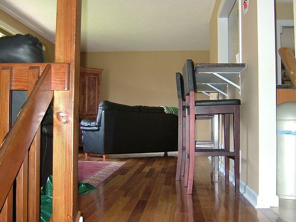 Hardwood floors, granite kitchen bar