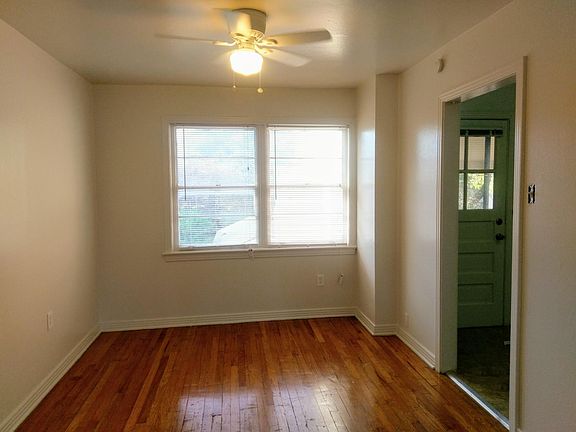 The dining room with the kitchen entryway