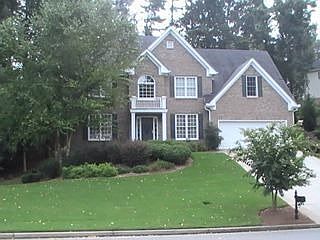 three sided brick home