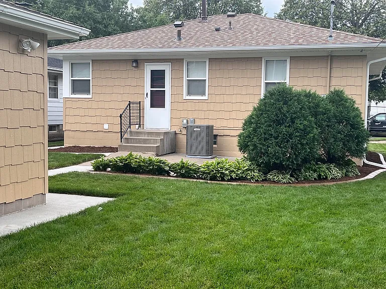 Rear of home with patio