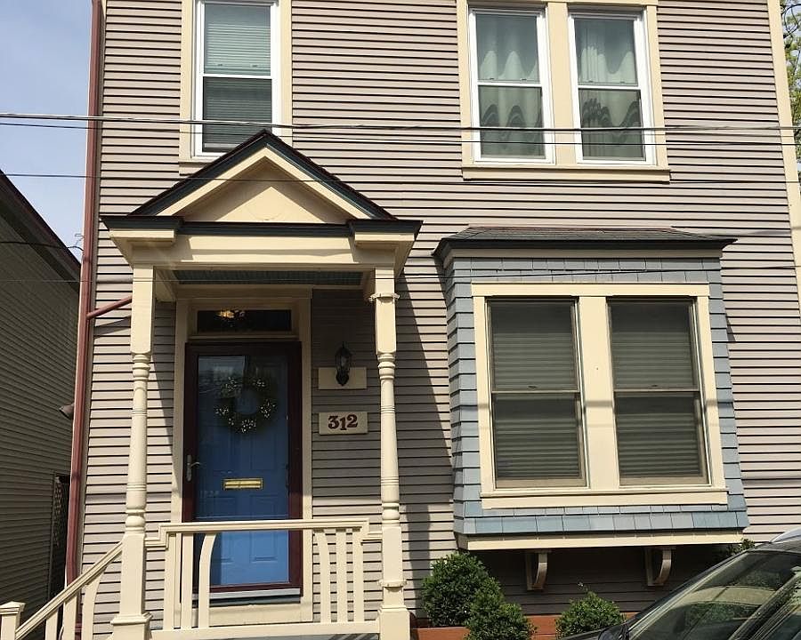 Freshly painted exterior on quiet cobblestone street
