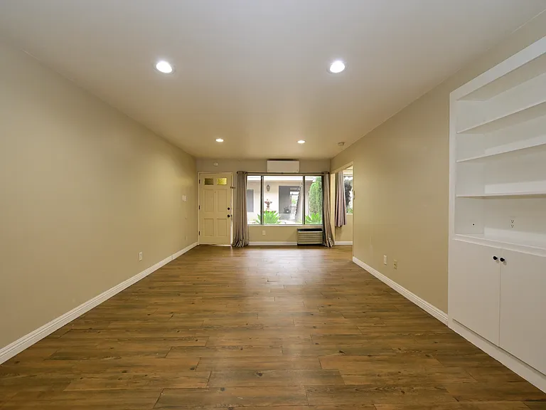 Fully Updated unit with In-unit Laundry, built-in cabinet, SS kitchen appliance + quartz countertop