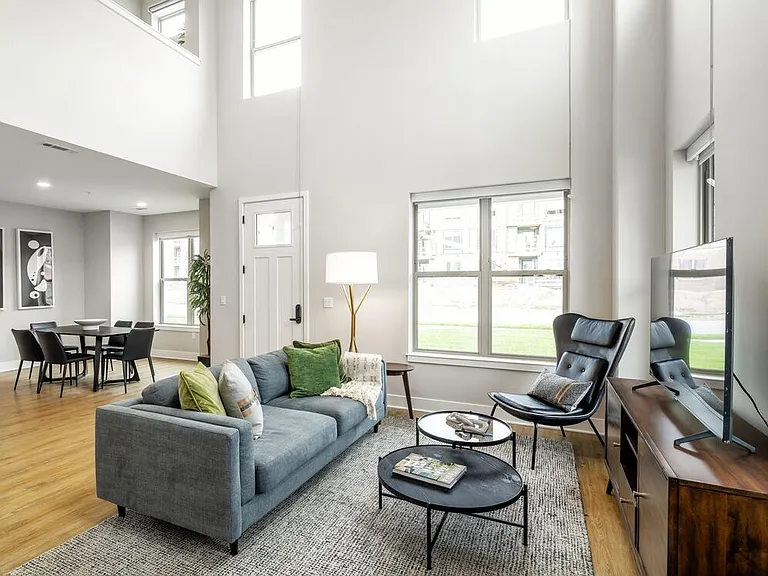 Signature Collection Townhome living room with hard surface flooring