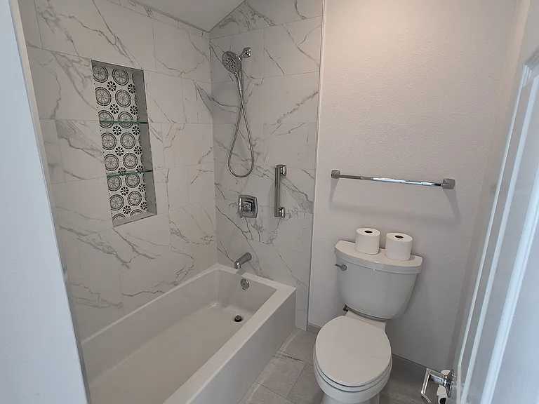 Upstairs bathroom has tub with all new bathroom fixtures.