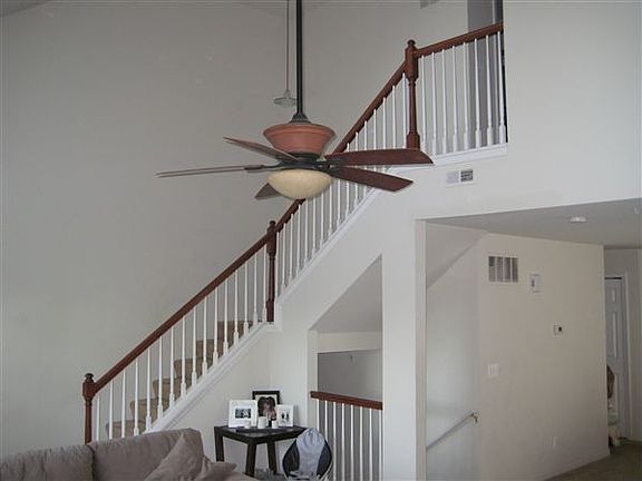 Staircase leading to upper level with bedrooms