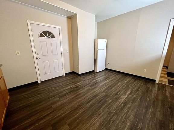 kitchen includes frig and door to the back porch