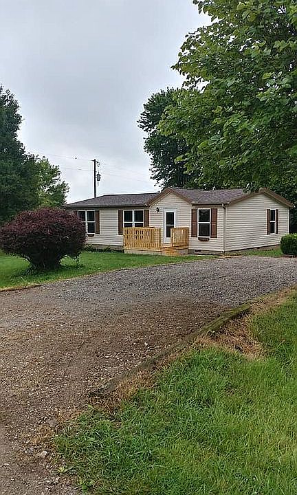 Front of home/gravel drive