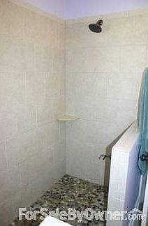 Master Bath
						:
						Completely remodeled, dark wood cabinets, granite