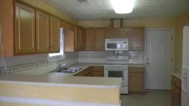 Building Photo - 8028 Garrett Pines Dr
