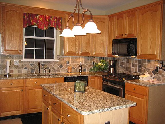 Kitchen w/granite counter-tops