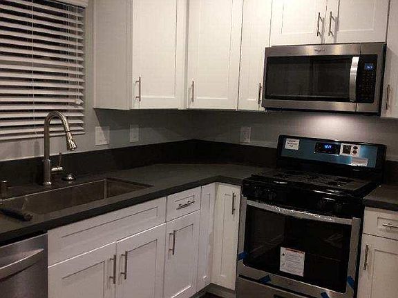 Beautiful Kitchen with new cabinets and stainless appliances