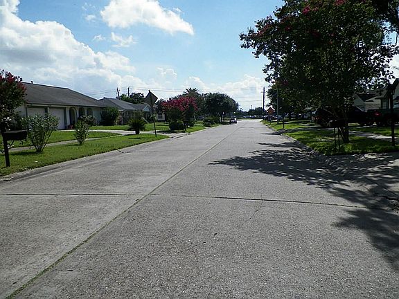 The opposite view of the street and neighborhood