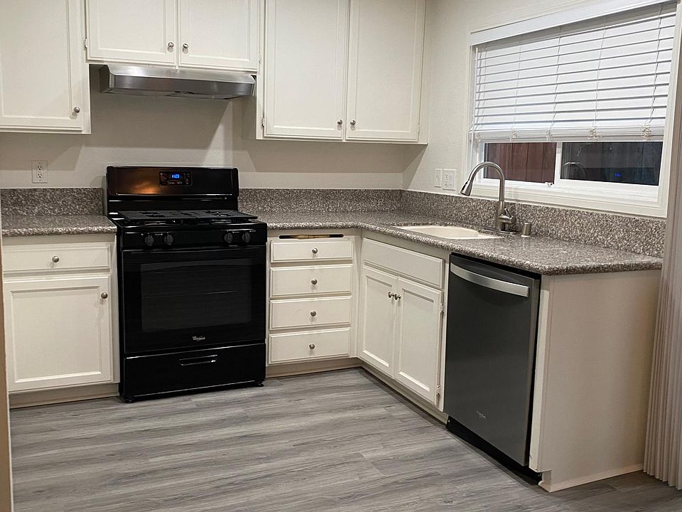 Kitchen - This will be renovated with new cabinets and quartz countertops!