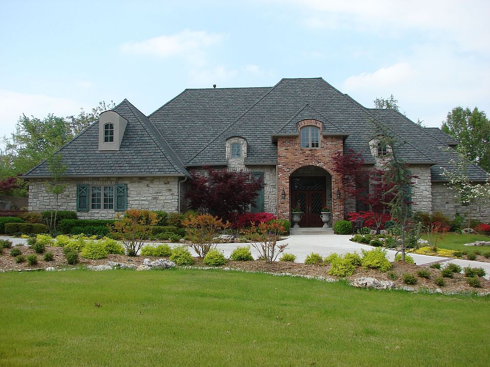 50-yr roof 2006; circle drive, additional landscaping added 2009