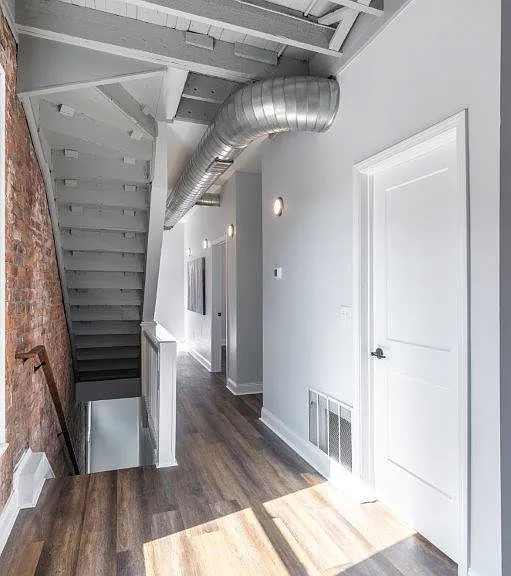 I don't have photos of the laundry right now. It is the first door on the right. The right turn leads to restroom. Third bedroom is the second door (I do not have pics for third bedroom right now, but it is small-ish, and in good condition)