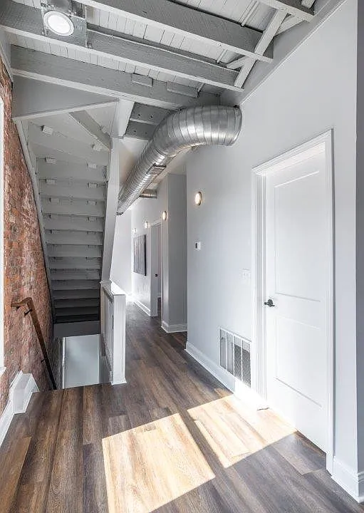 I don't have photos of the laundry right now. It is the first door on the right. The right turn leads to restroom. Third bedroom is the second door (I do not have pics for third bedroom right now, but it is small-ish, and in good condition)