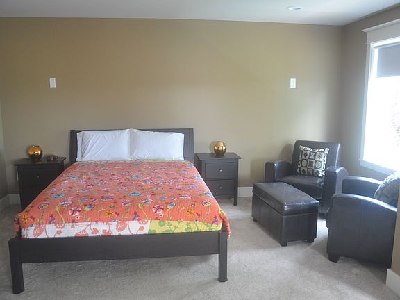 Master suite with lake view, walk-in closet, attached office and master bath (not furnished)