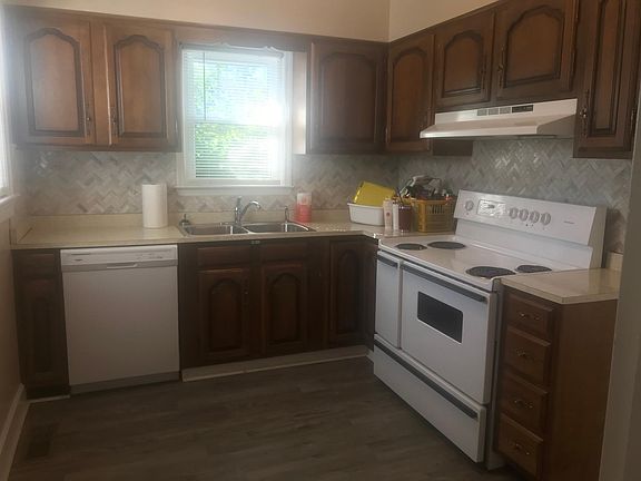 kitchen with refrigerator, stove, dishwasher, pantry