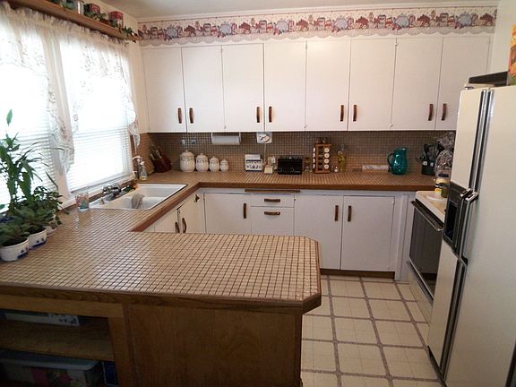 Kitchen with tile counters