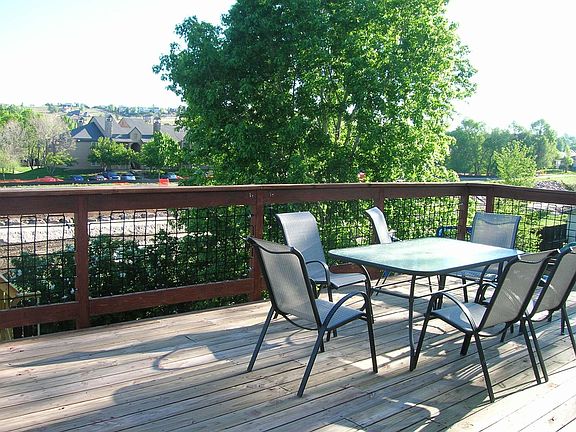 Deck overlooking creek & trail.