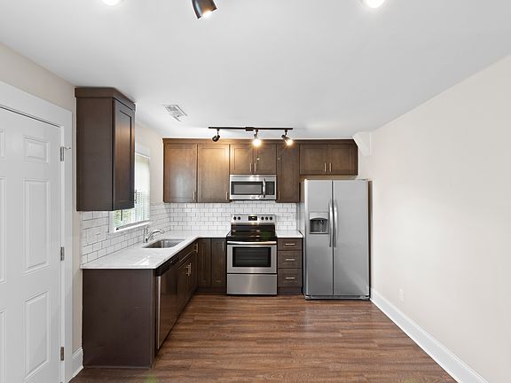 The kitchen and appliances are all new and provides generous storage and food prep options.