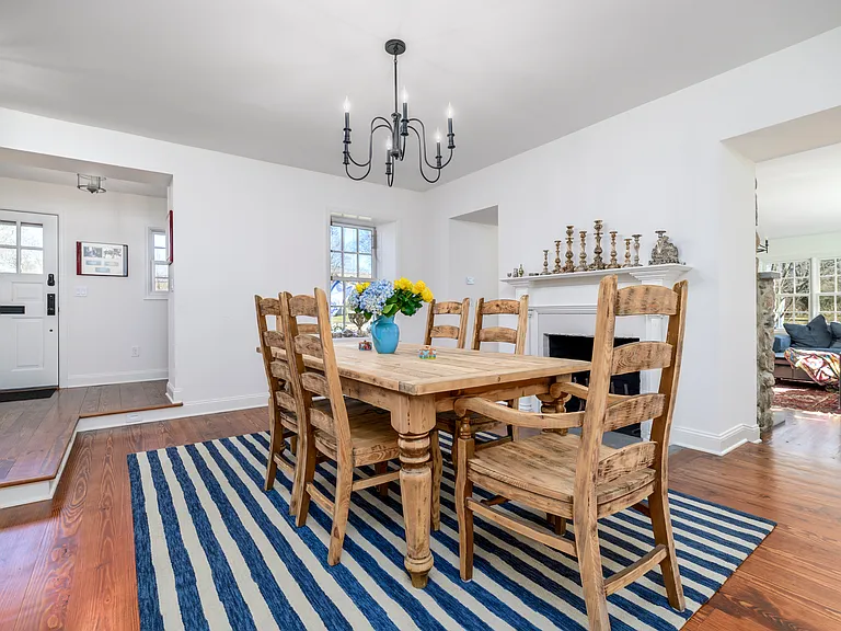 Large Dining Room with Fireplace, adjacent to the kitchen and living room.