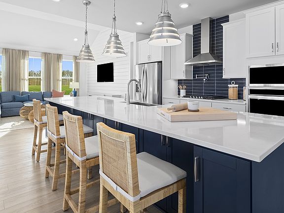 Chef s Kitchen with Quartz Countertops in the St. Kitts model at Wetherby