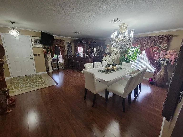 Entry and Formal Dining and Formal Living Room Area